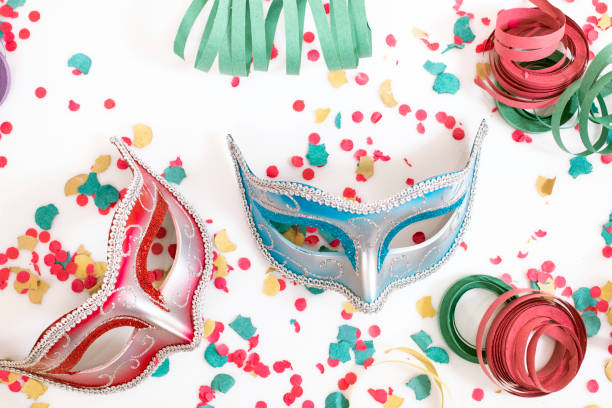 istock venetian masks with confetti 1127656939