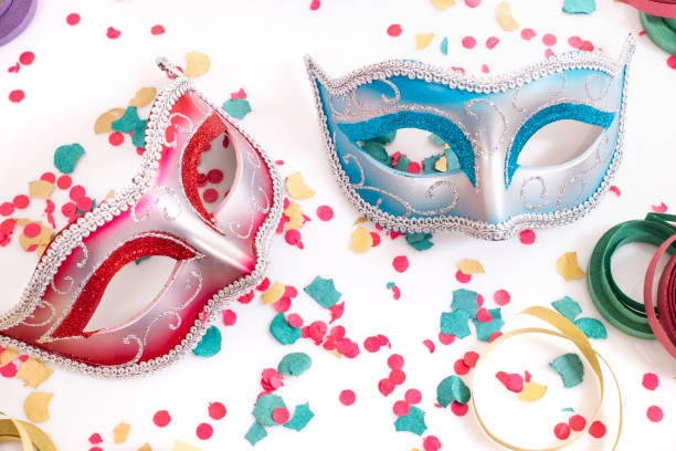 istock venetian masks with confetti 1127656941