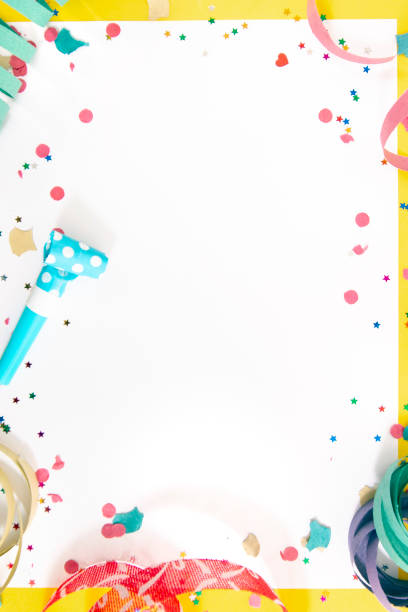 istock carnival confetti on white paper 1127657000
