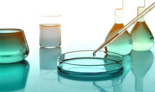 istock Laboratoy glassware with chemicals, chemistry science 1127667444