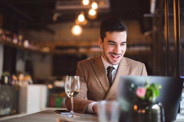 istock Handsome businessman in restaurant 1127670837