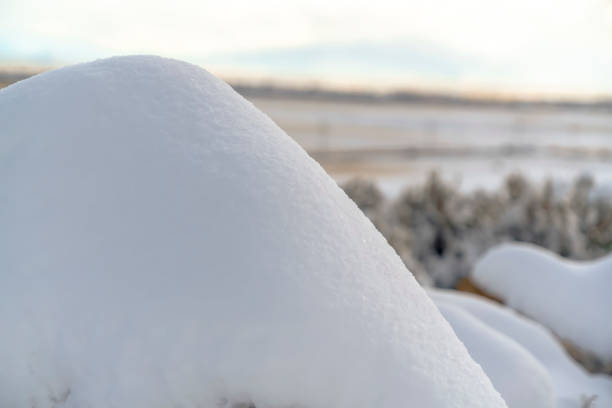istock Mound of powdery white snow on a sunny winter day 1127676621