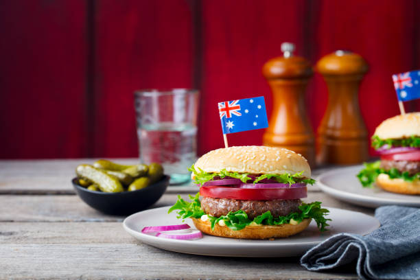 istock Burger with Australian flag on top. Wooden background. Copy space. 1127685637