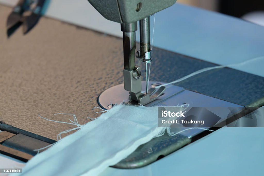 sewing machine,Close up - electric sewing machine. Adhesive Tape Stock Photo