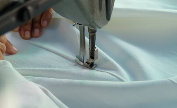 istock sewing machine,Close up - electric sewing machine. 1127686258