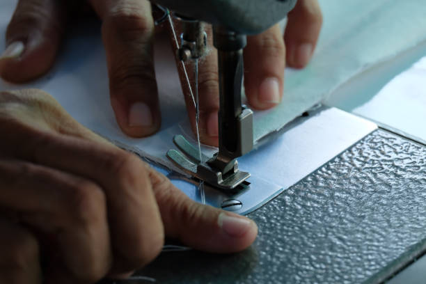 istock sewing machine,Close up - electric sewing machine. 1127686266