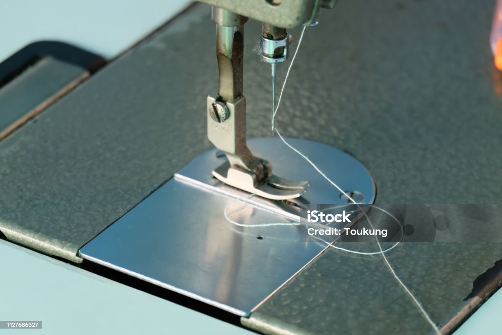 sewing machine,Close up - electric sewing machine. Adhesive Tape Stock Photo