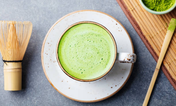 istock Matcha green tea latte in a cup. Top view. 1127686540