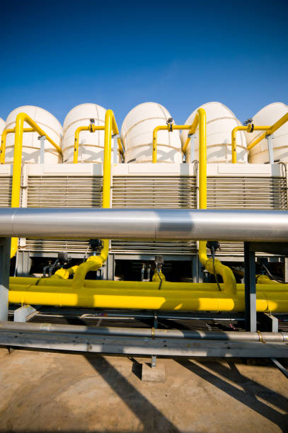 istock Rooftop cooling tower unit with chiller units and compressors in large building 1127687534