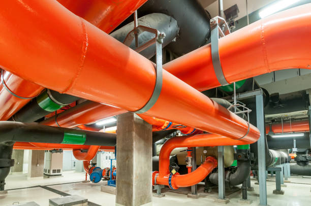 istock Pumping station and Electrical power generator  industrial interior pipes line in large building 1127687560