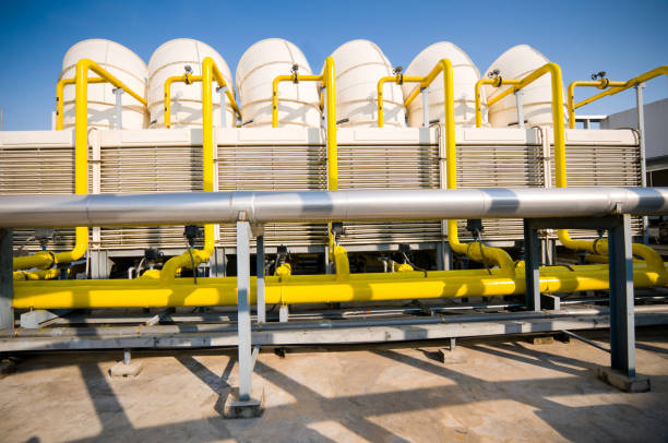 istock Rooftop cooling tower unit with chiller units and compressors in large building 1127687679