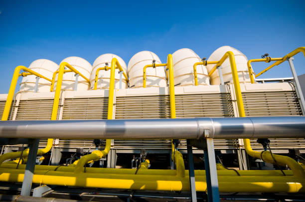 istock Rooftop cooling tower unit with chiller units and compressors in large building 1127687699