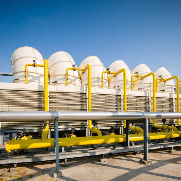 istock Rooftop cooling tower unit with chiller units and compressors in large building 1127687709