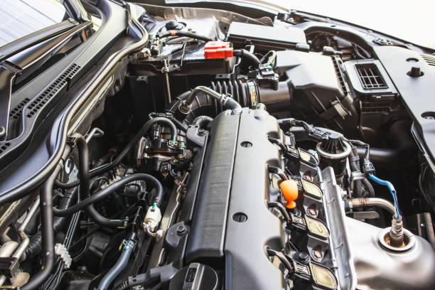 detail des neuen auto-benzin-motor, hintergründe hautnah - intake of energy stock-fotos und bilder