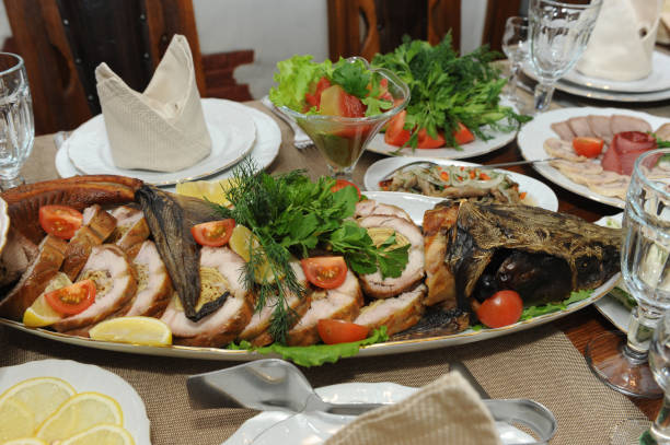 istock Assorted meat on a plate. Banquet table. Festive dishes 1127696474