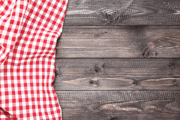 istock Red napkin on wooden table 1127702778