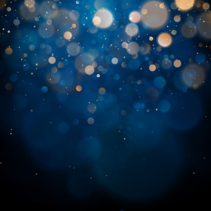 istock Blurred bokeh light on dark blue background. Christmas and New Year holidays template. Abstract glitter defocused blinking stars and sparks. EPS 10 1127702919