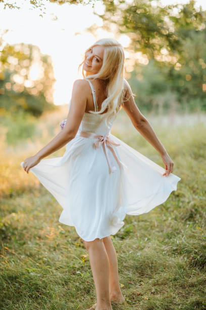 istock Beautiful blonde in nature 1127703060