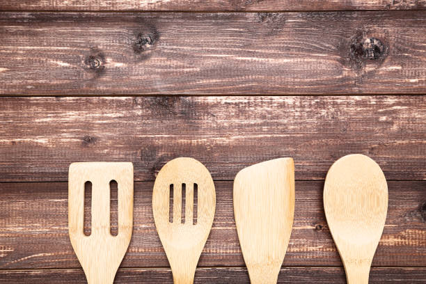 istock Wooden kitchen cutlery on brown table 1127703728