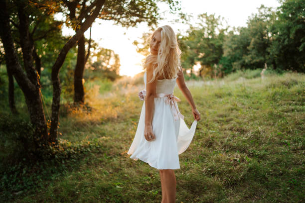 istock Beautiful blonde in nature 1127704969