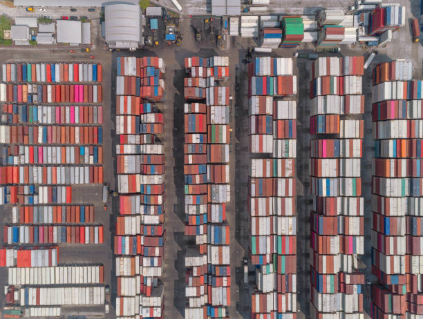 istock Aerial top view container warehouse for logistics shipping, import export or transportation. 1127704973