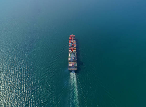 istock Aerial view container ship at the sea full load container for logistic, import export, shipping or transportation. 1127705076