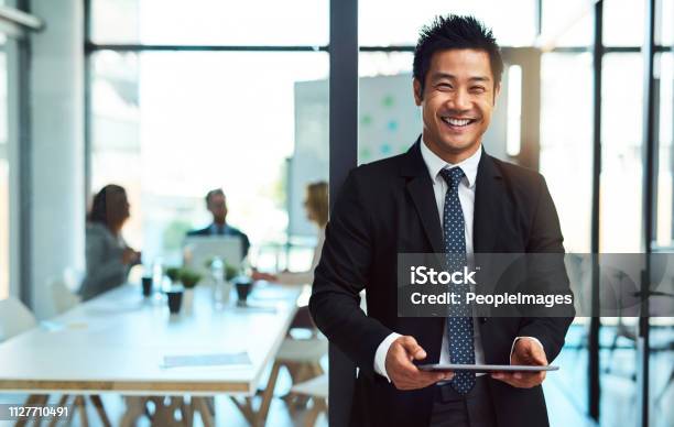 Putting His Business Online Stock Photo - Download Image Now - Businessman, Japanese Ethnicity, Men