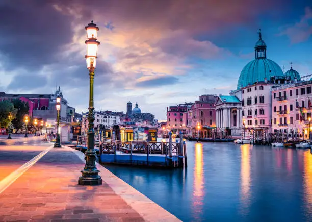 Fantastic spring sunrise in Venice with Church of San Simeone Piccolo. Colorful evening scene in Italy, Europe. Magnificent Mediterranean landscape. Traveling concept background.