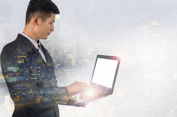 istock Double exposure of a businessman 1127711175