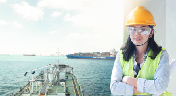 istock Double exposure of Engineering wearing yellow helmet and working at construction site about transportation of international logistics background. 1127712232
