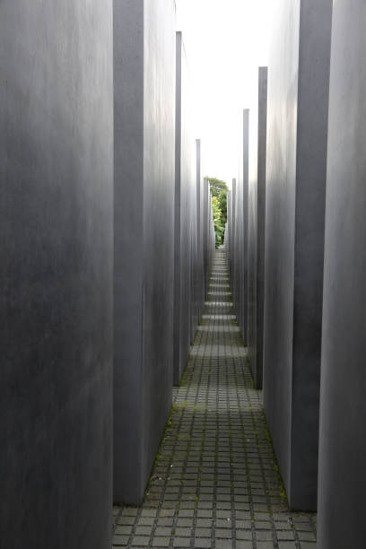 Berlin, Germany - August 19, 2017: Inside Memorial to the Murdered Jews of Europe like a maze with many immense blocks of cement