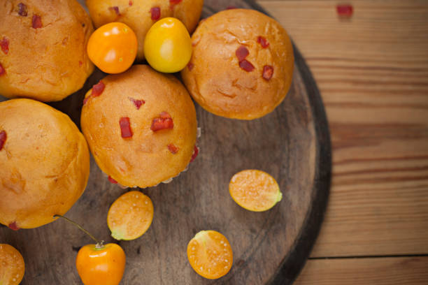 istock Close-up of golden muffins. 1127715212