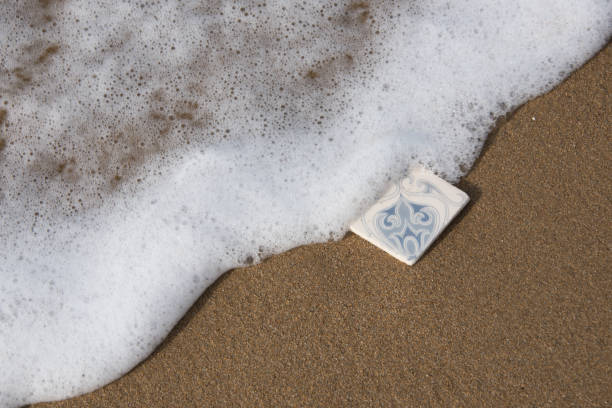 istock Italian Tile on a Sandy Beach with Surf 1127722410