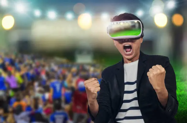 Photo of Young man with virtual reality headset.