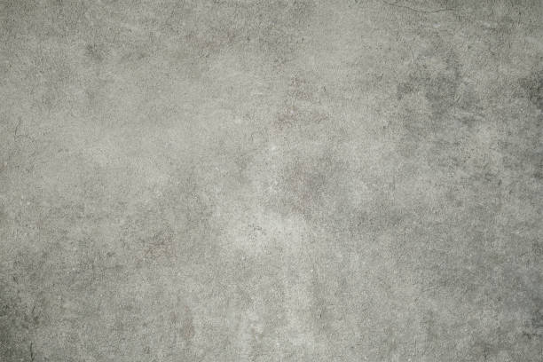istock Concrete old dirty texture.Cement wall surface with old damage that is dirty and dusty. 1127724171