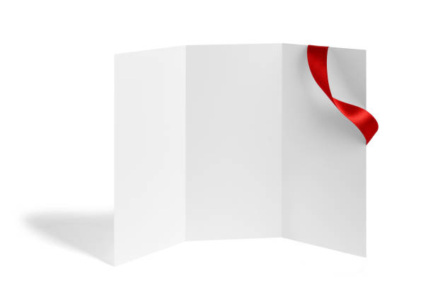 istock folded leaflet red ribbon bow paper template book desktop calendar 1127724537