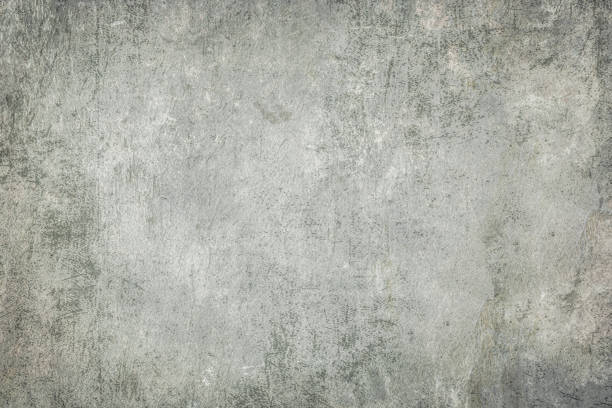 istock Concrete old dirty texture.Cement wall surface with old damage that is dirty and dusty. 1127725375