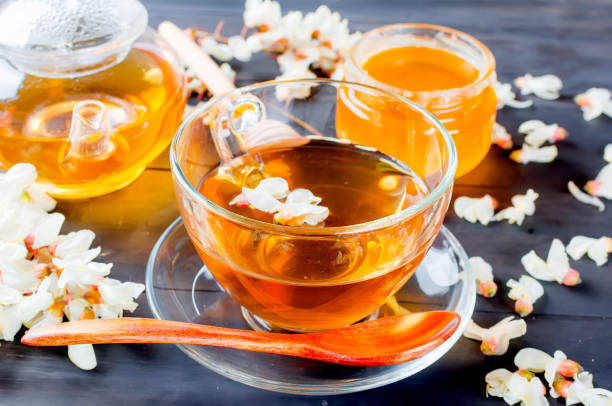 istock Healing Acacia herbal tea and flowers 1127725601