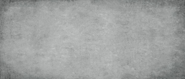 istock Long concrete backgrounds in horizontal position.Gray wall cement texture. 1127726203