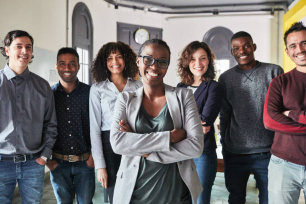 istock Portrait of confident business team 1127726433