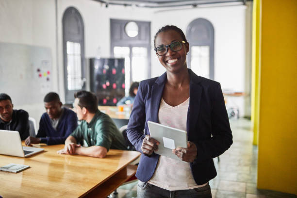 istock Confident african businesswoman at office 1127726490