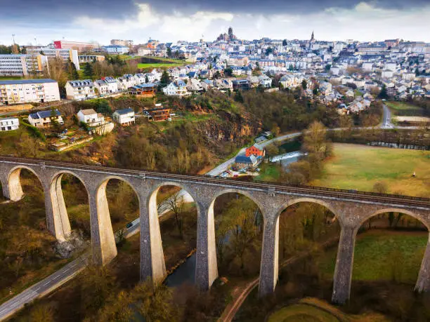 General view of Rodez city with Gascarie Viaduct on foreground in cloudy winter day, France