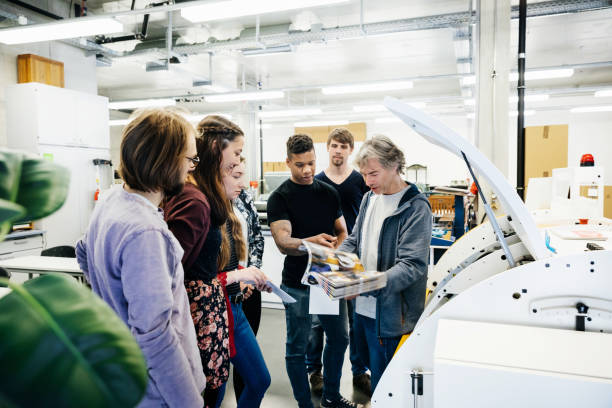 istock University Print Technician Giving Lab Tour 1127727819