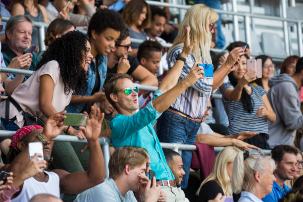 istock Spectators taking selfie with smart phone 1127730030