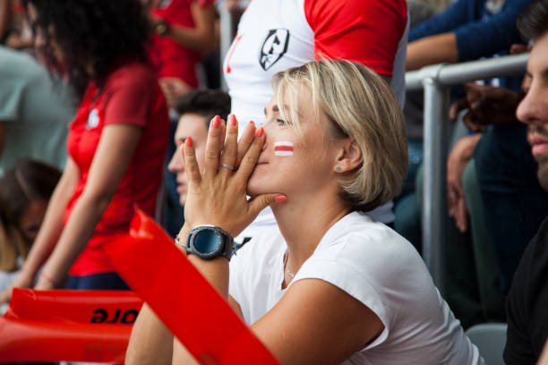 istock Spectators watching football match 1127730638