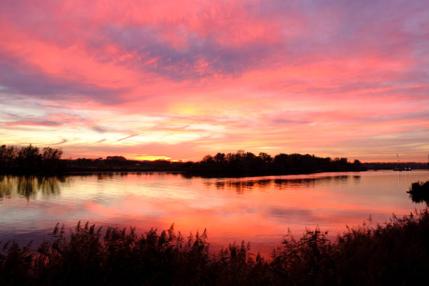 istock Majestic sunset over the river IJssel during a beautiful autumn evening 1127732788