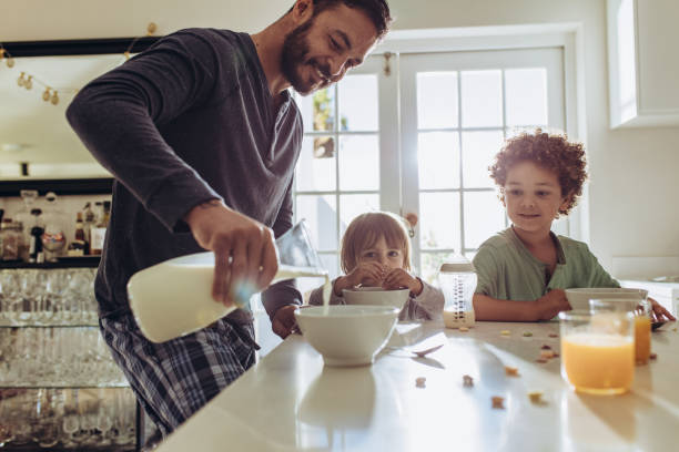 istock Father preparing breakfast for his kids 1127732816