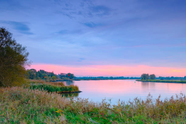istock Majestic sunset over the river IJssel during a beautiful autumn evening 1127732890