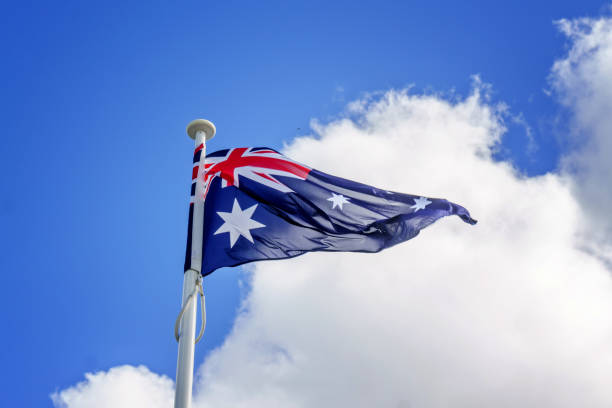 istock Australian flag blowing in the wind 1127733536
