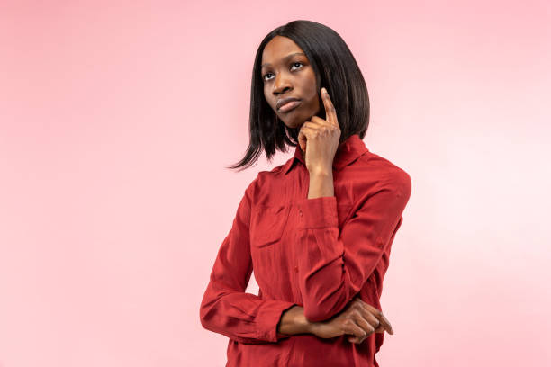istock Young serious thoughtful business woman. Doubt concept. 1127733660